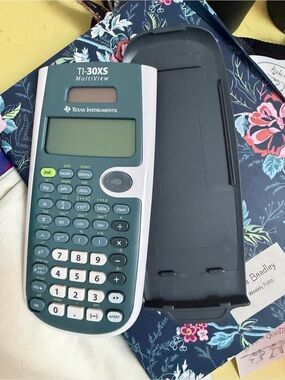 Texas Instruments TI-30XS Scientific Calculator in Teal and White